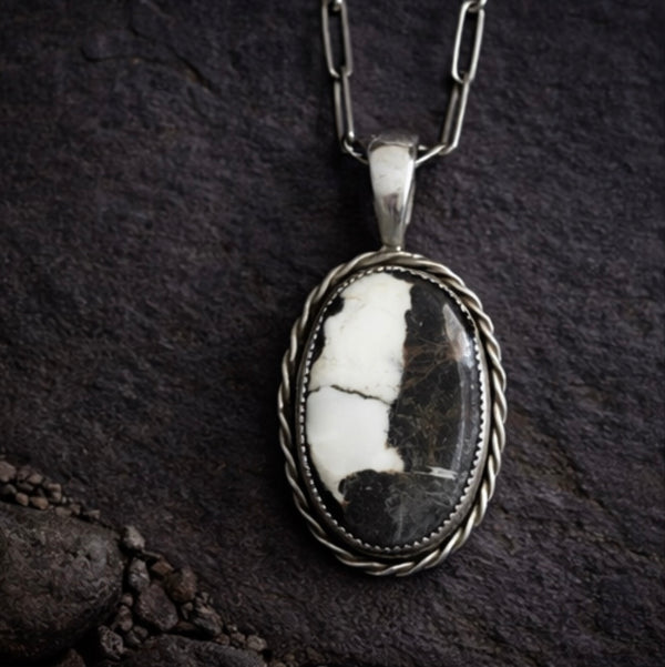 White Buffalo sterling silver necklace pendant on 18 inch chain