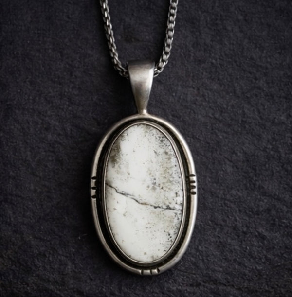 white buffalo stone necklace set in sterling silver
