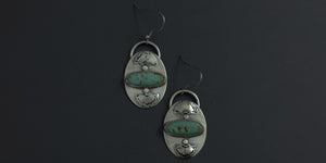 Green kingman turquoise stones set horizontally in .925 sterling silver handmade earrings with hand stamped fan details above and below the stone