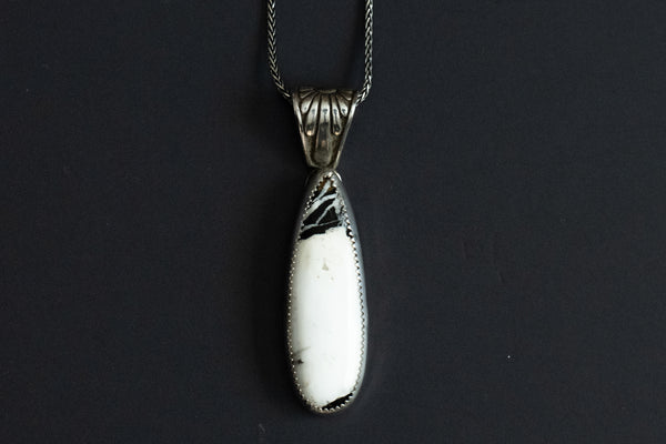 white buffalo stone set in handmade sterling silver pendant