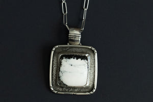 White Buffalo sterling silver necklace pendant with black and white stone